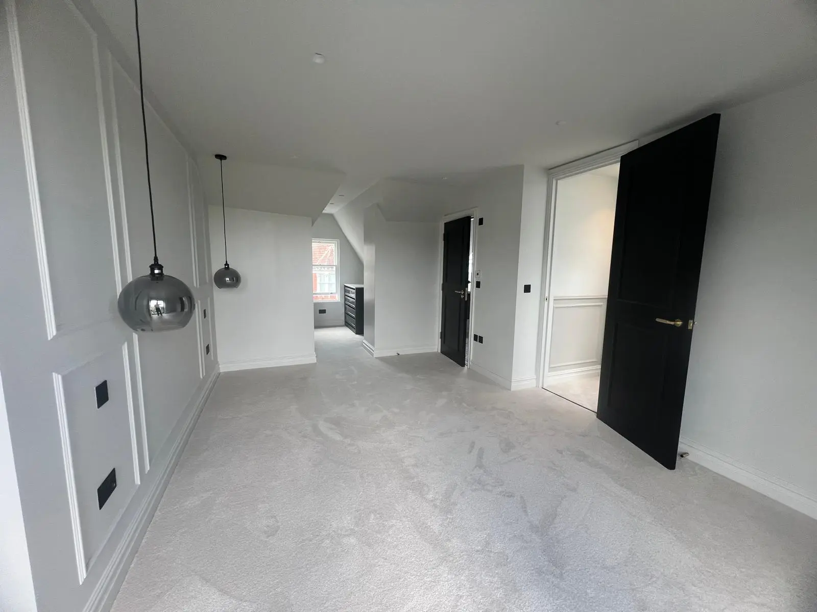 Professionally fitted light carpet in a finished London interior